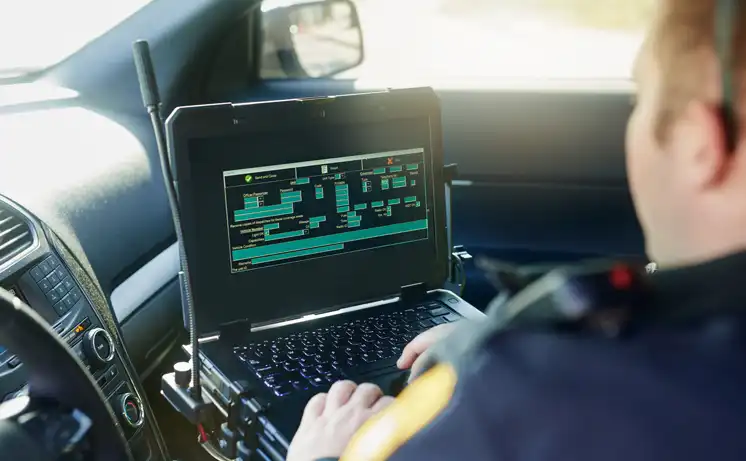 Arlington Police Officer in her patrol car.